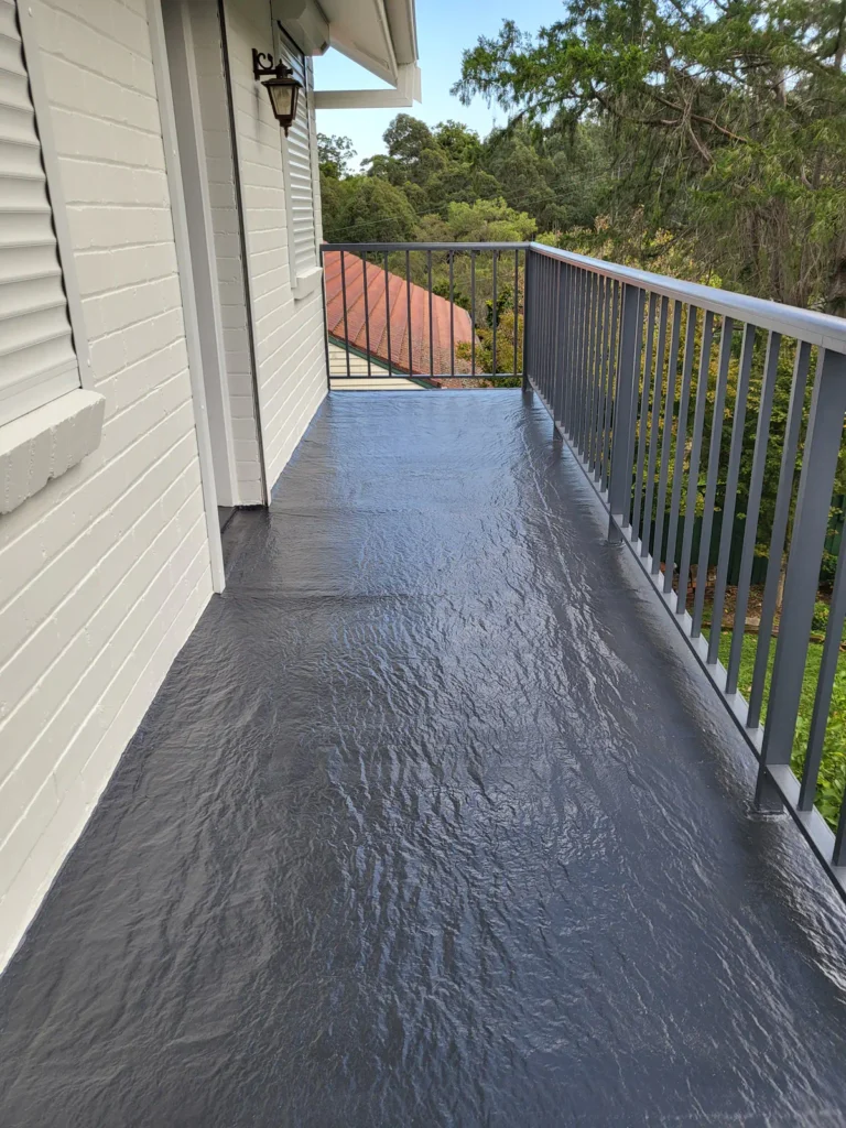 Balcony floor and railings after wash, prep and paint