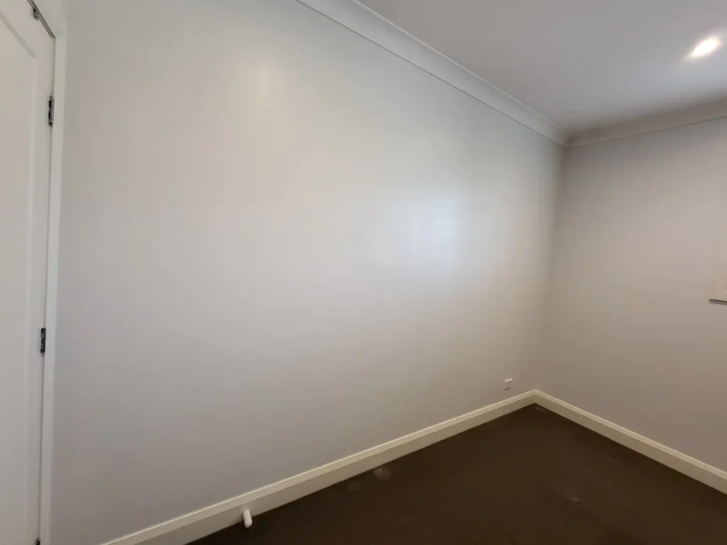 Bedroom after fresh interior paint job in Hornsby