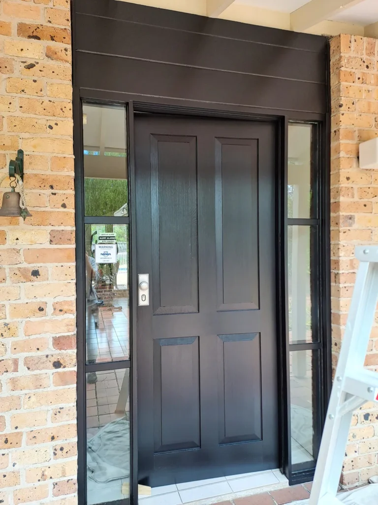Black exterior entry door painted for fresh look