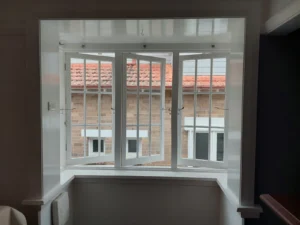 Casement colonial grid window after painting by house painters in Sydney