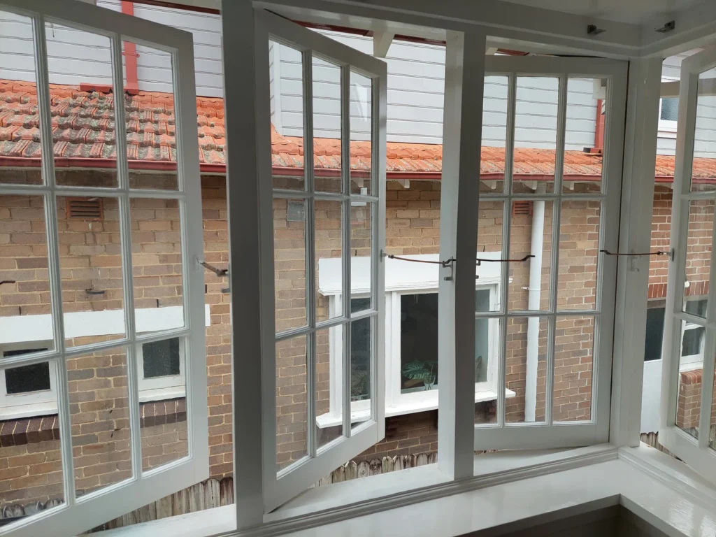Casement colonial grid window after painting (close-up)