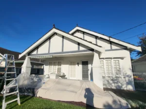 Prepping double gable ends at Eastwood home for painting by house painters in Sydney