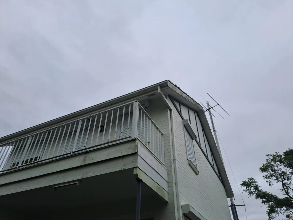 Rear and side exterior walls before repainting