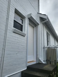 Exterior brick wall after painting by house painters in Sydney
