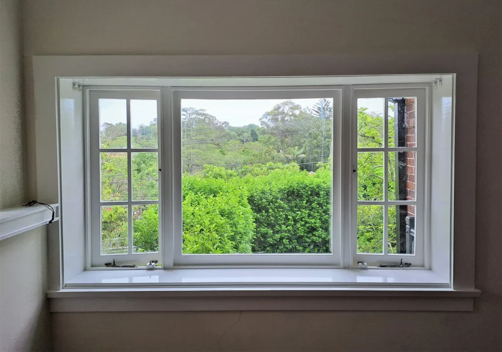 Finished bay window painting in Roseville home