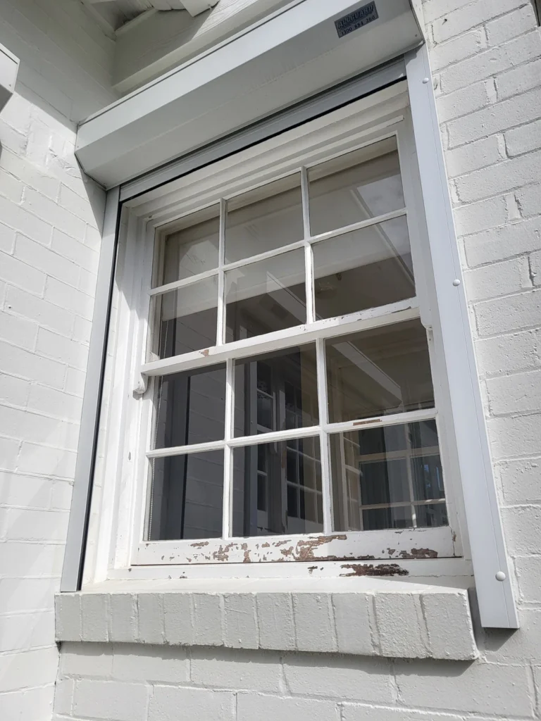 Sliding colonial grid window before painting